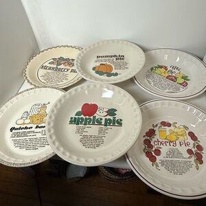 Vintage ceramic recipe pie plates from the 1970s or 1980s.